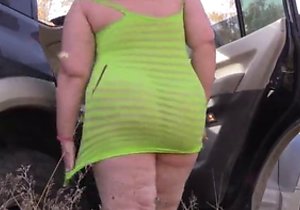 Mature BBW exhibitionist shows her fat legs outdoors