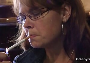 Brunette showing her oral skills for the camera